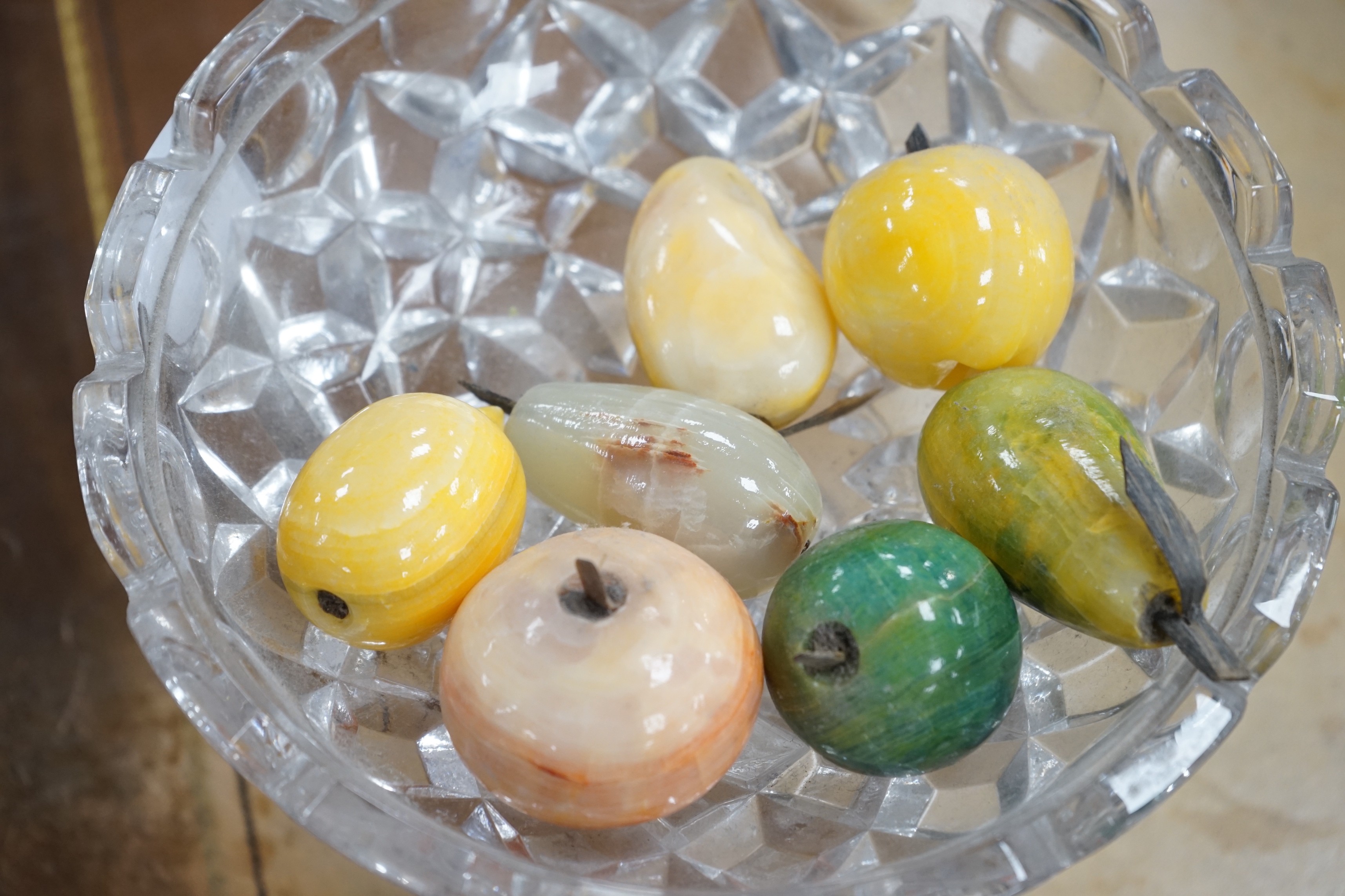 A collection of polished stone fruits
